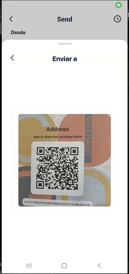 Phone scanning the public Address QR on the retired training paper wallet